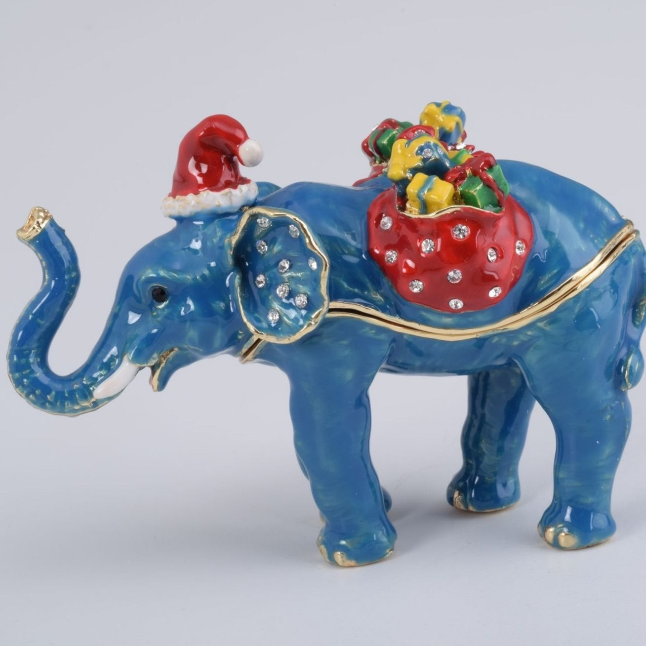 Christmas Elephant bearing gifts and presents