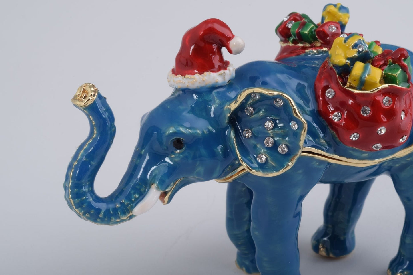 Christmas Elephant bearing gifts and presents