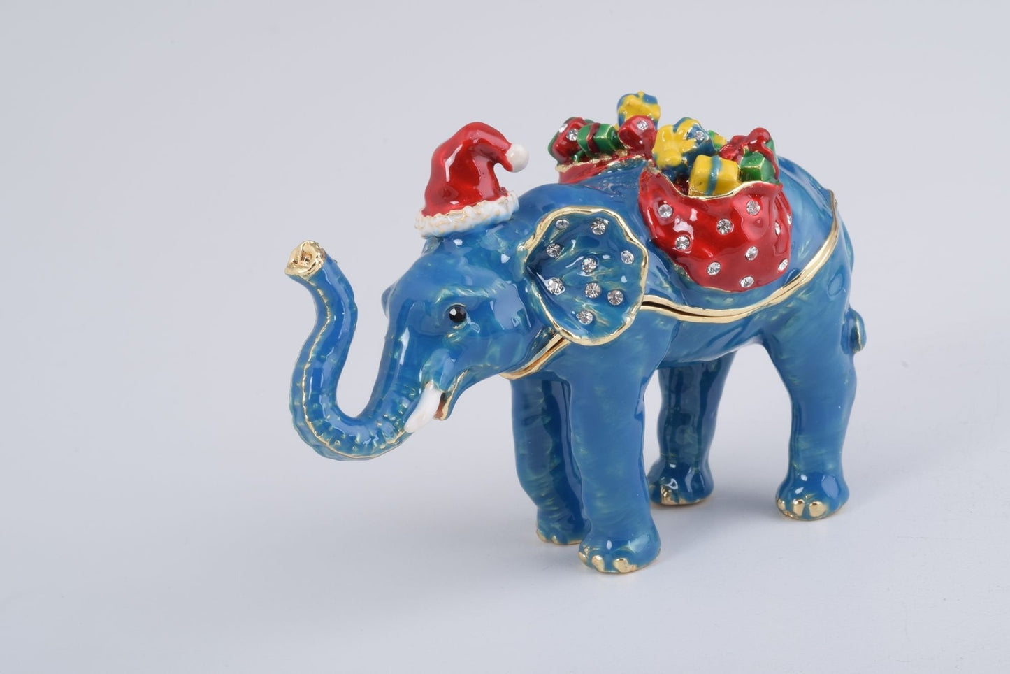 Christmas Elephant bearing gifts and presents